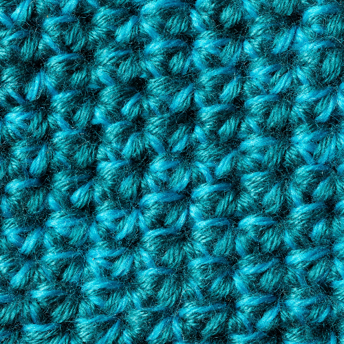 Close-up of textured turquoise crochet